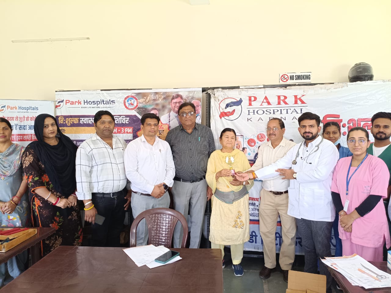 Doctors conducting employee health check-up at Carus Laboratories on World Health Day 2025