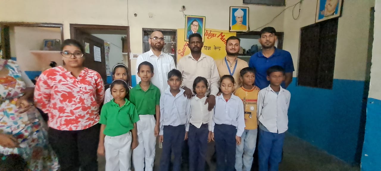 Carus Laboratories team celebrating World Egg Day with underprivileged children at Saraswati Vidyamandir School, Karnal, distributing eggs and promoting egg nutrition awareness.